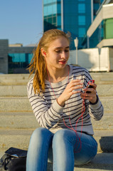 Young woman listening to music