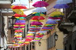 Colorful umbrellas in the city, Italy