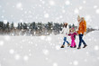© Syda Productions - happy family in winter clothes walking outdoors