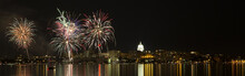 Colorful Night Time Fireworks Display Over Lake Monona And The Wisconsin State Capitol Building In Madison 