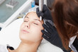 © Stocked House Studio - Cosmetologist applying permanent make up on eyebrows