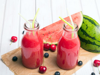 Wall Mural - Fresh watermelon juice on a wooden background