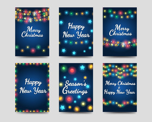 Wall Mural - new year and christmas greetings cards set vector with garlands