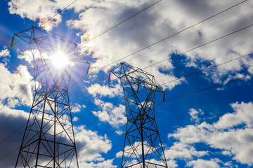 overhead power lines in a cloudy winter sky