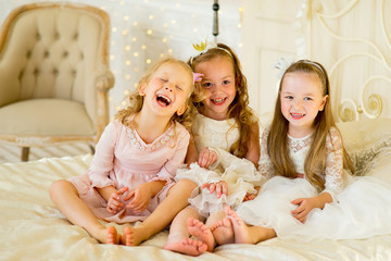 three little princess on the bed