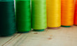 Several of colored spools of thread for sewing and embroidery