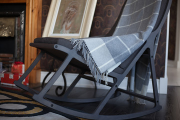 Canvas Print - Rocking chair with a checkered plaid