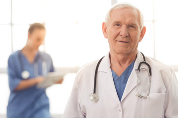 Wall Mural - Old and young doctors