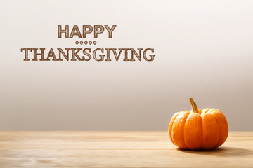 Wall Mural - thanksgiving message with orange pumpkin