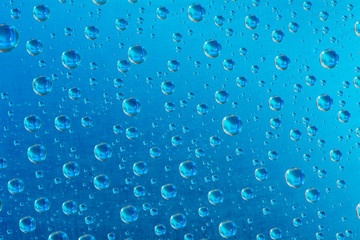  drop of water on blue background