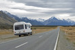 Motorhome on Mount Cook Road (State Highway 80) along the Tasman River leading to Aoraki / Mount Cook National Park and the village