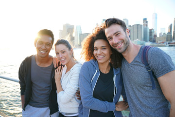 Wall Mural - Group of friends enjoying sunset on Brooklyn heights promenade, NYC