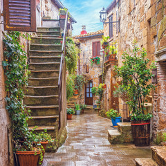 Fototapete - Alley in Italian old town, Tuscany, Italy