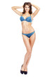 © Andrey_Arkusha - Full length portrait of young girl wearing blue bikini
