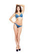 © Andrey_Arkusha - Full length portrait of young girl wearing blue bikini