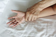 A hairy man's hand holding a woman hand for rape and sexual abus