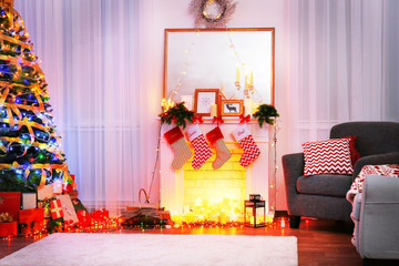 Poster - Beautiful fireplace in living room decorated for Christmas