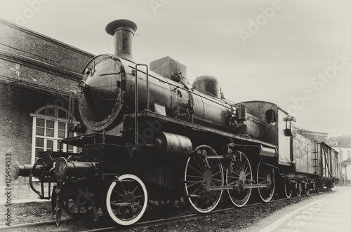 Nowoczesny obraz na płótnie Italian steam locomotive in the station of Turin Ponte Mosca (Italy), repair workshop for old trains