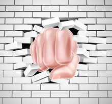 Fist Punching Through White Brick Wall