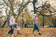 © chika_milan - Dad, mom and son  flying a kite in nature