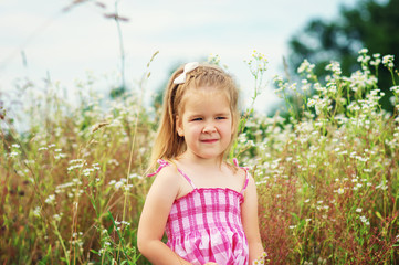 Wall Mural -  little girl on the meadow