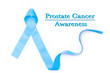 Light blue ribbon symbolic sign for prostate cancer awareness campaign and men's health in November isolated on white background: Shiny blue satin texture textile on dark wooden backdrop
