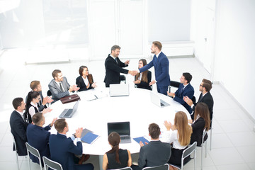 Poster - head of the company speaks to colleagues at conference