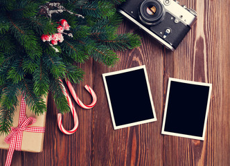 Leinwandbilder - Blank photo frames with gift, pine tree and camera