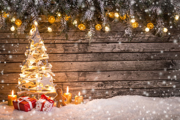 christmas tree on wooden background