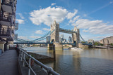 Fototapeta Londyn - Tower Bridge, Thames Path, and City Skyscrapers from the South Bank of the Thames in Southwark London
