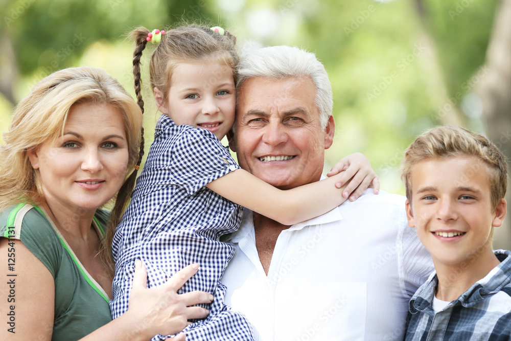 Grandparents with grandchildren in park