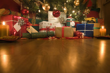 Christmas Presents Under An Illuminated Christmas Tree
