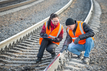 Wall Mural - Railroad workers maintaing railways