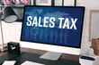 © Africa Studio - Modern workplace with computer. Text SALES TAX on screen. Online tax report concept.