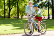 © Syda Productions - grandfather and boy with bicycle at summer park
