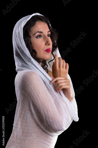 Model posing in a mesh net tubular piece of stretchy fabric Canvas-taulu