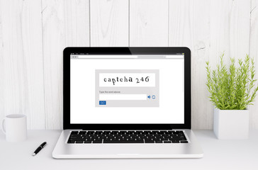 Poster - laptop on table captcha