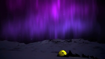 northern lights aurora borealis in the snowy mountains and yellow tent.