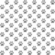 Seamless gray and white paw print pattern