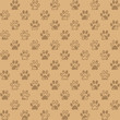 Muddy paw prints in subdued browns, a seamless background pattern