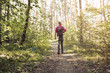© Andrii Zastrozhnov - Silhouette of a man sitting on the trail in the forest