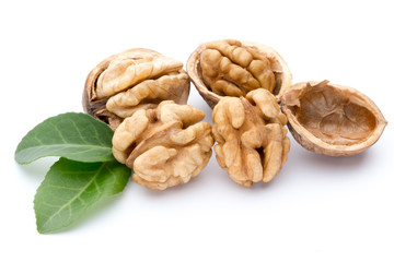 Wall Mural - Walnut and walnut kernel isolated on the white background.