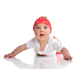 Wall Mural - Four month Infant child baby girl lying on a floor happy smiling