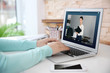 © Africa Studio - Woman video conferencing with lawyer on laptop. Video call and online service concept.