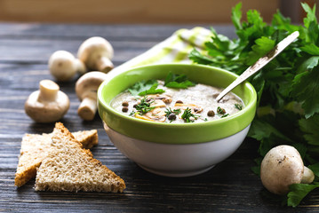 Wall Mural - Mushroom puree soup with allspice, parsley, champignons and toas