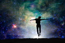 Silhouette Of A Woman Jumping, Starry Night Background
