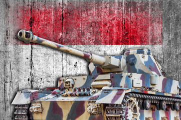 Military tank with concrete Monaco flag