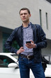 © retoncy - Young man using his phone