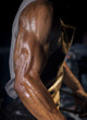© nexusseven - Worker's arem with big muscles