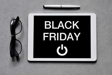 Poster - text black friday in a tablet